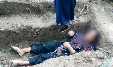 শাশুড়িকে দাফন দেওয়ার কবরে শুয়ে পুত্রবধূর বাধা